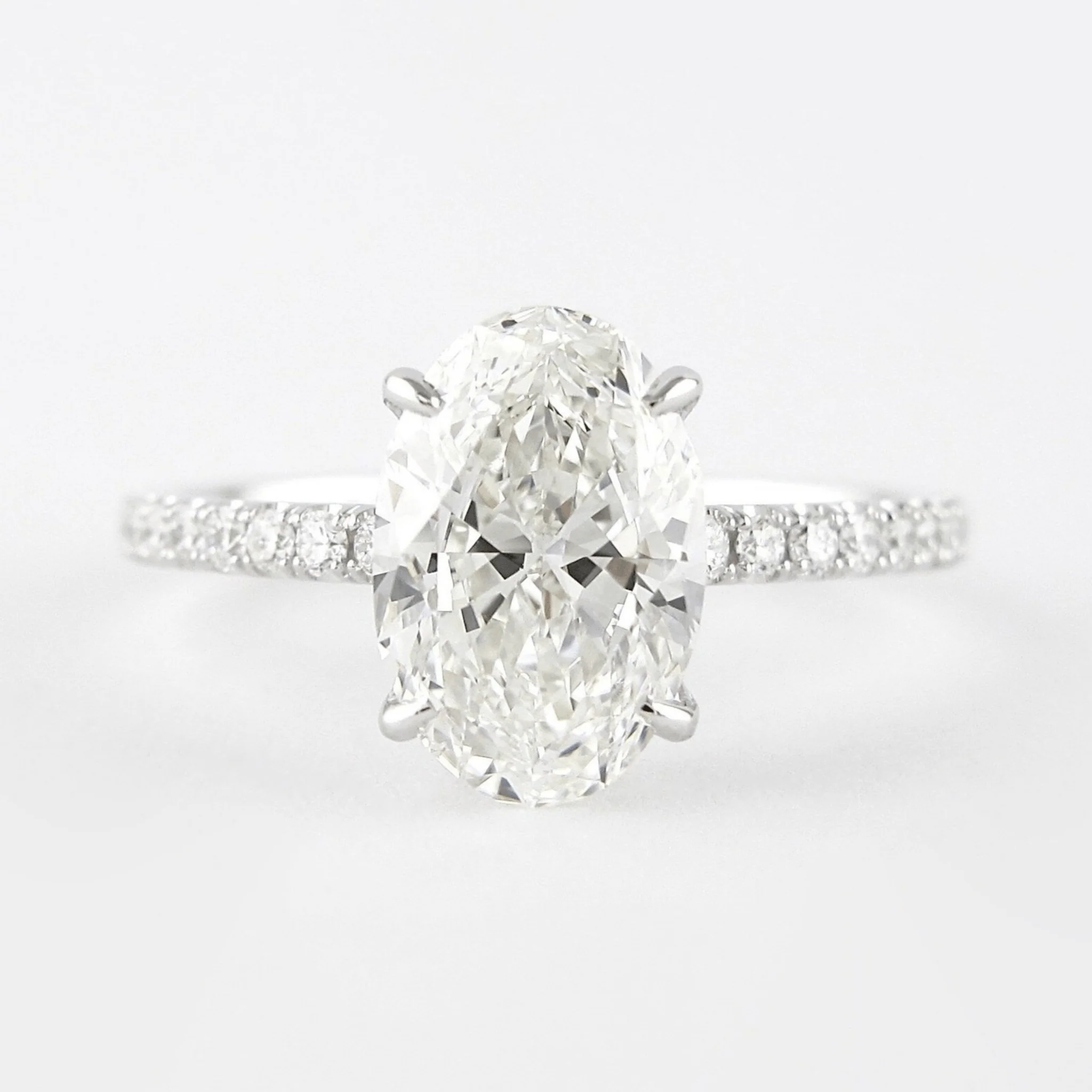 2.50 Carat Oval Cut Prong Set Lab Grown Diamond Engagement Ring with Pave Diamond Band - Image 8