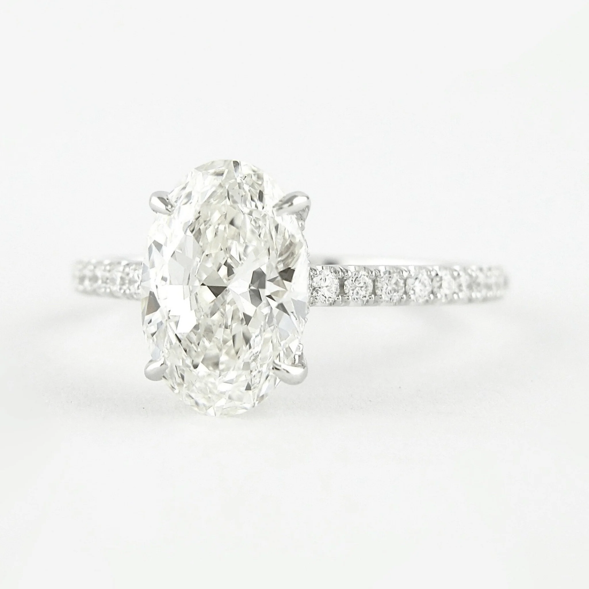 2.50 Carat Oval Cut Prong Set Lab Grown Diamond Engagement Ring with Pave Diamond Band - Image 9