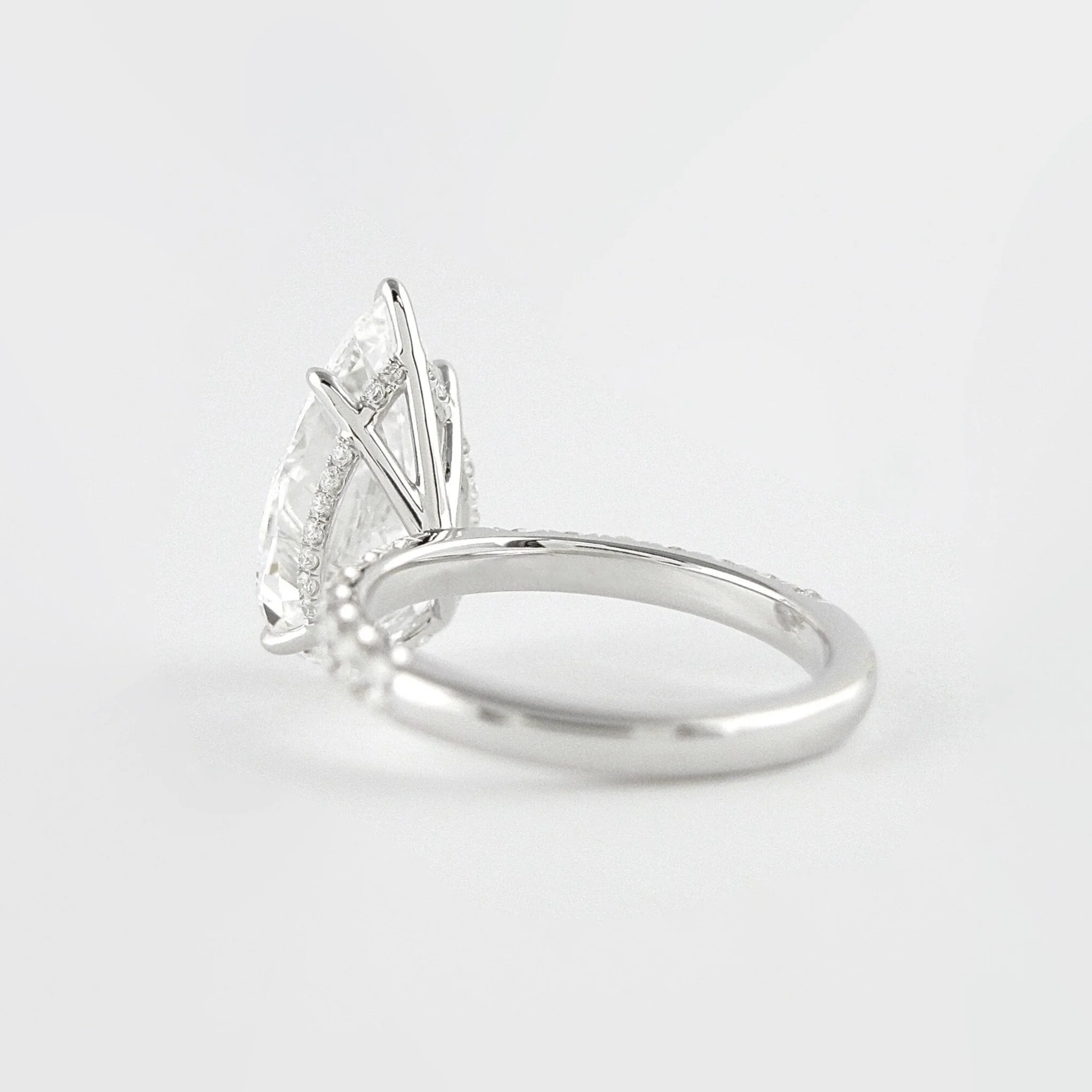 4 Carat Pear Cut Hidden Halo Engagement Ring with Pave Band - Image 10
