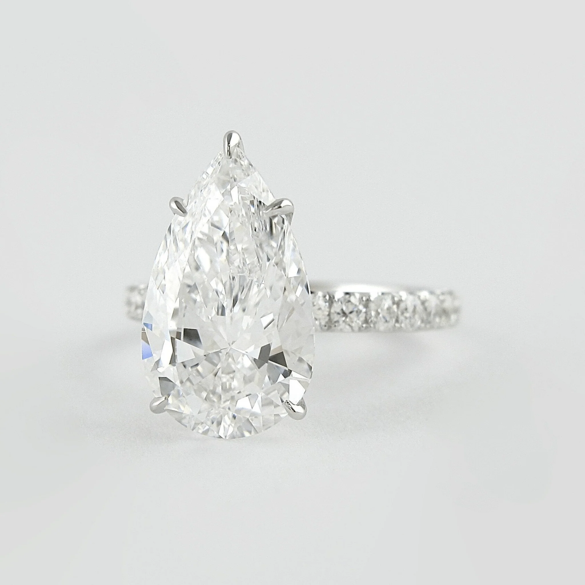 4 Carat Pear Cut Hidden Halo Engagement Ring with Pave Band - Image 9