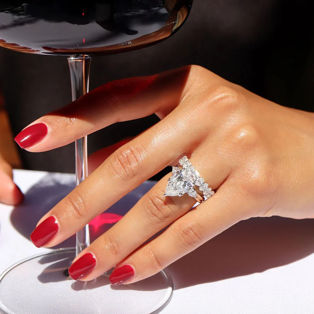 7 Carat Pear Cut Diamond Three Stone Ring with Accent Pear Diamonds - Image 3